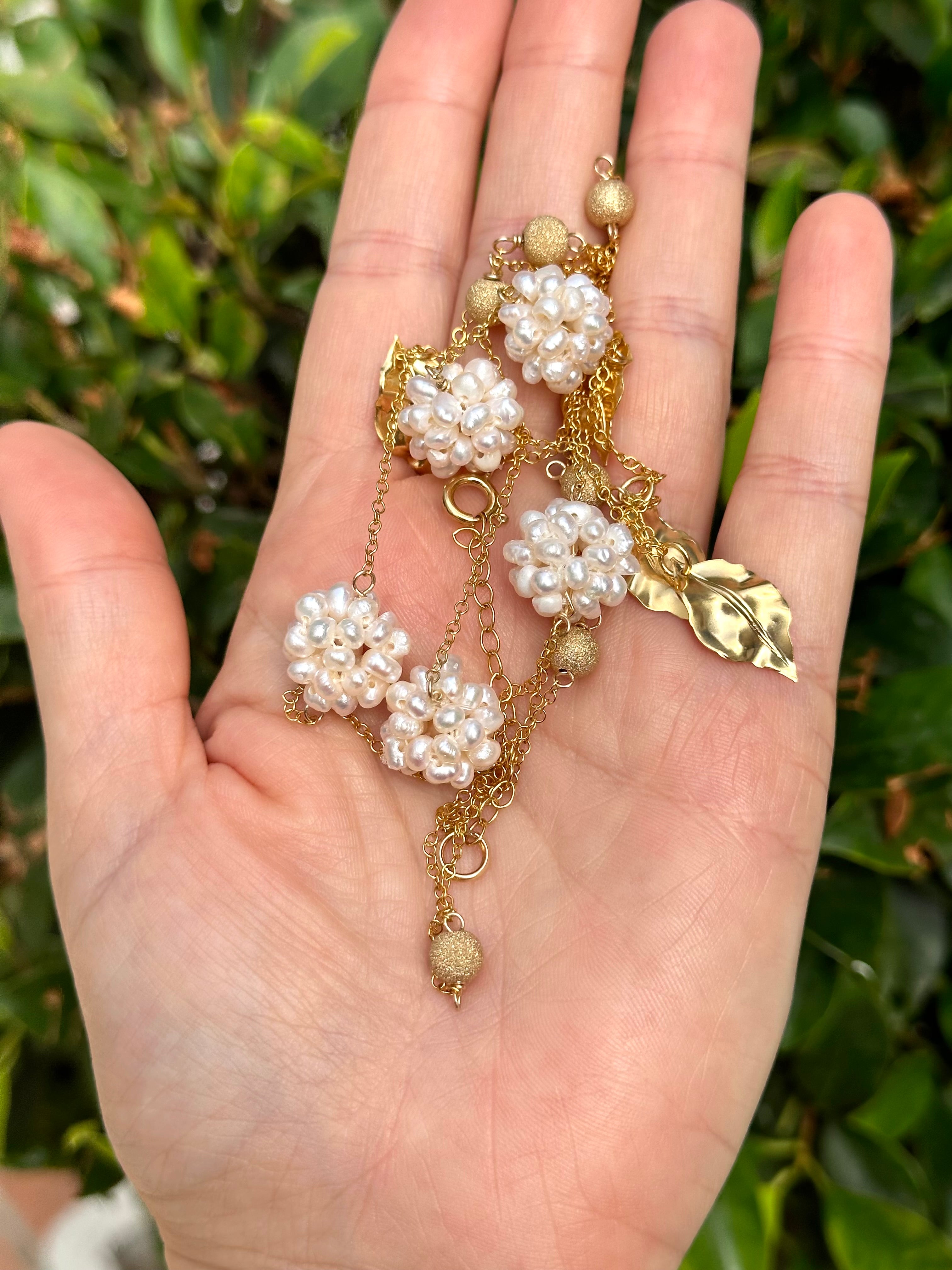 Long Chain Necklace With Pearl Balls And Golden Leaves