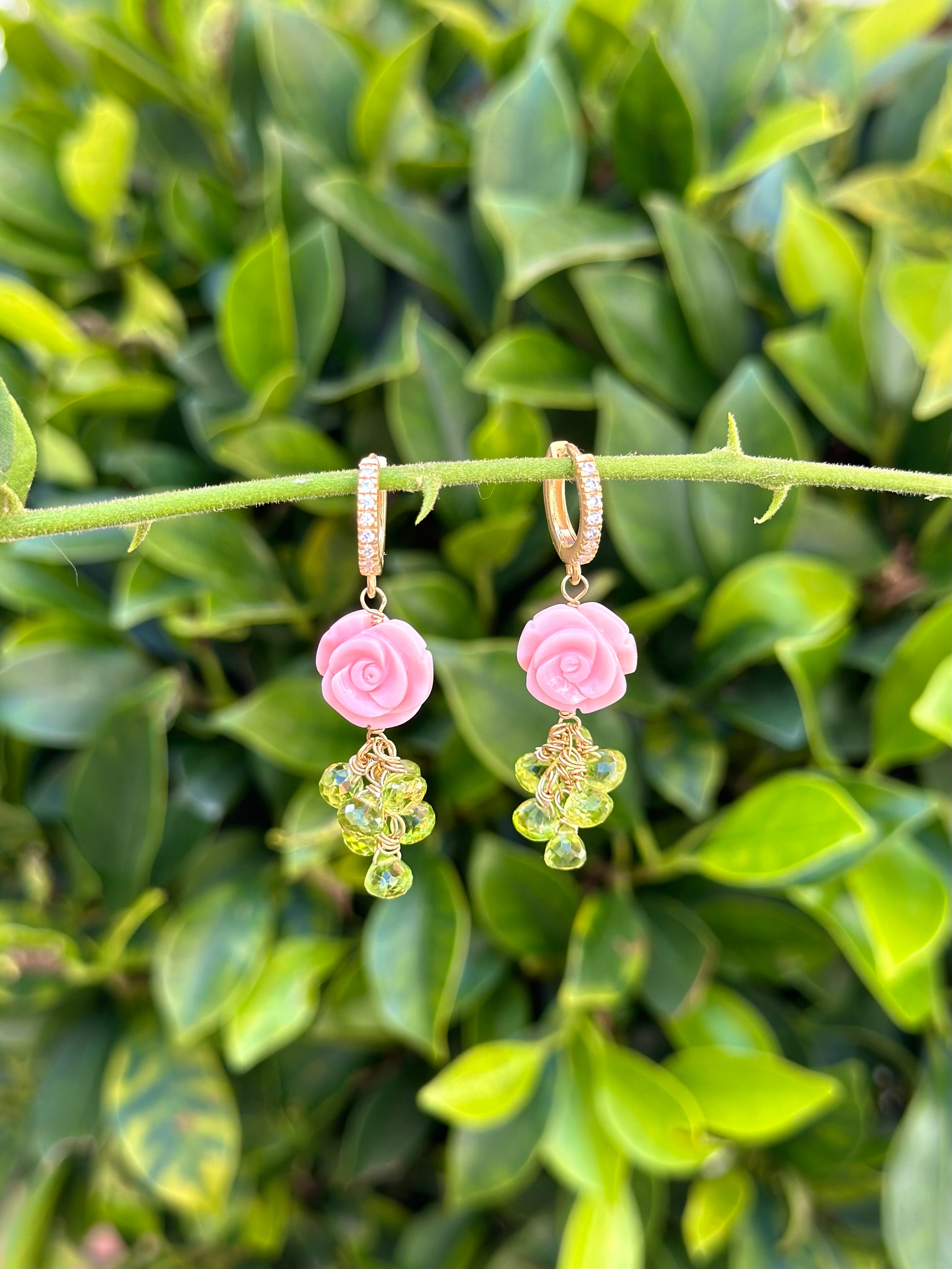 Carved queen conch shell rose and peridot drop earrings