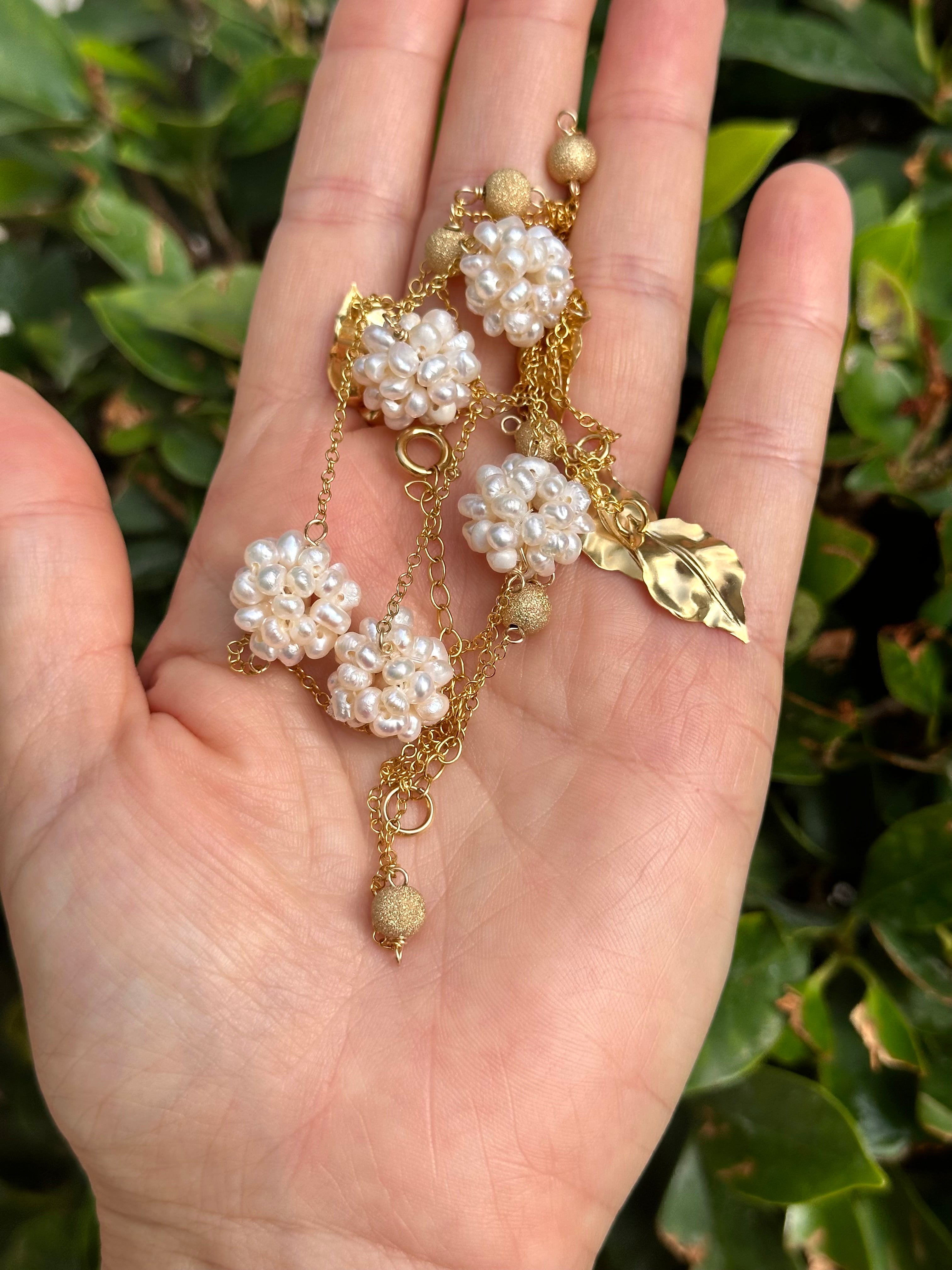 Long Chain Necklace With Pearl Balls And Golden Leaves