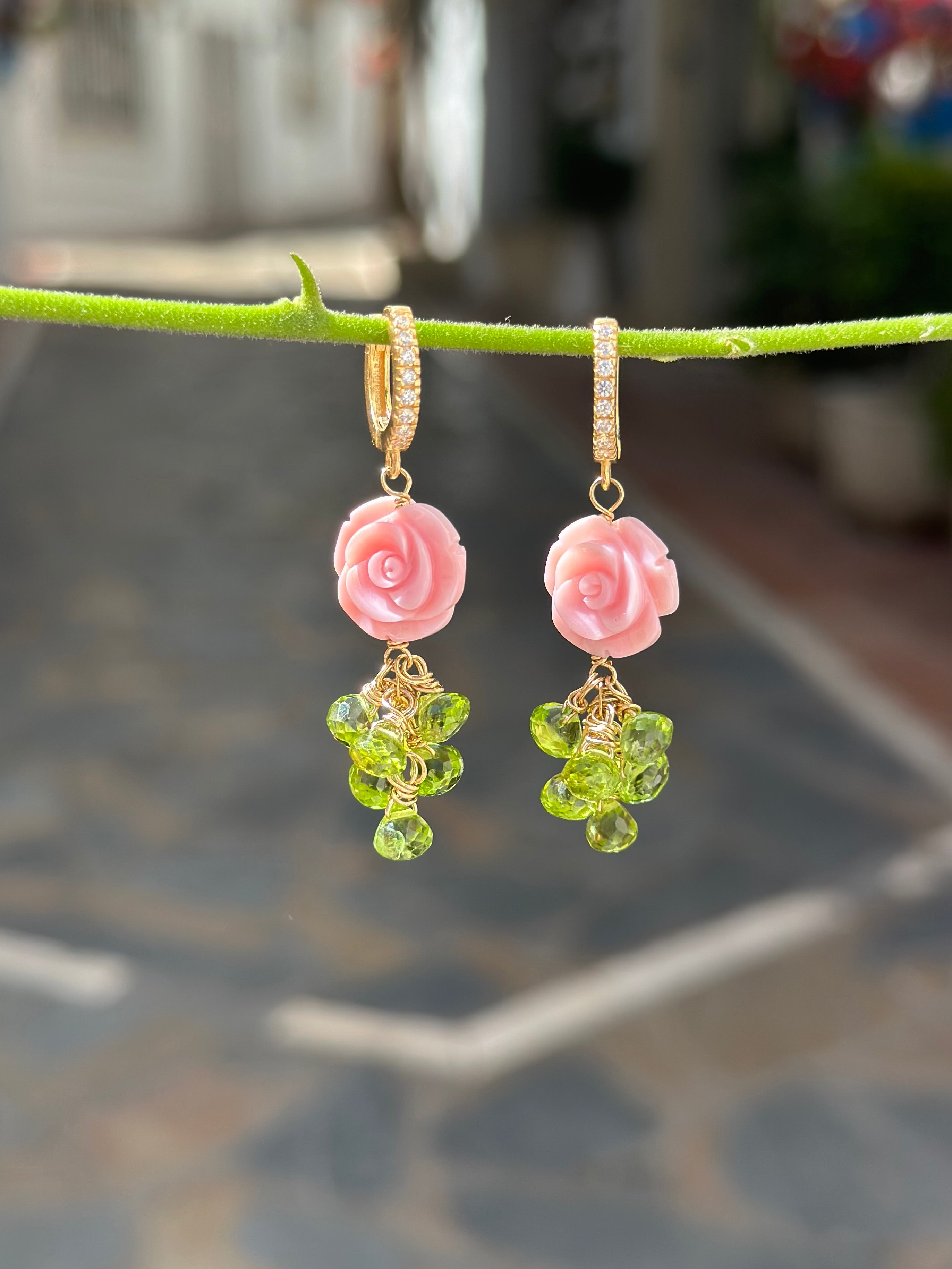 Carved queen conch shell rose and peridot drop earrings