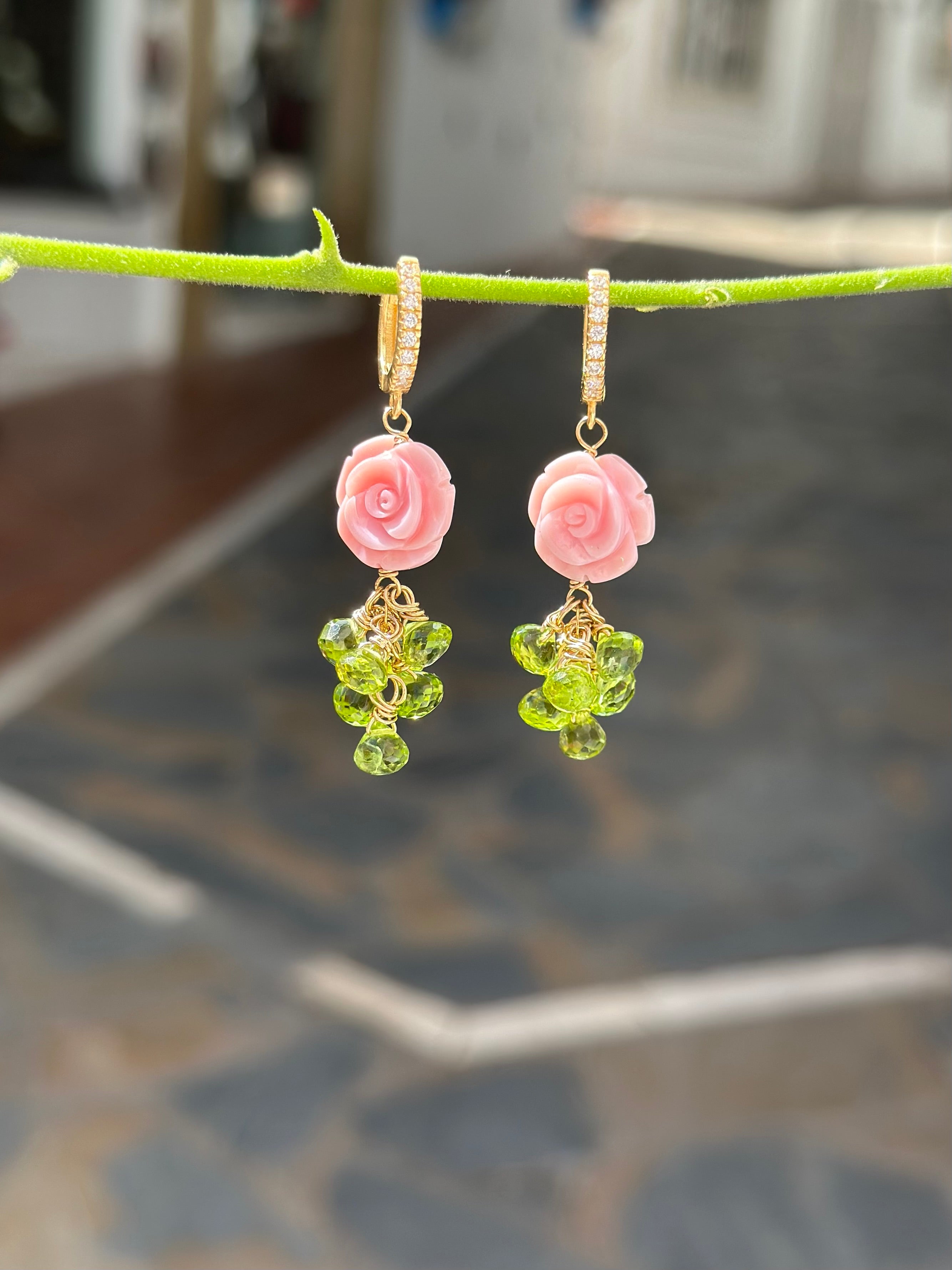 Carved queen conch shell rose and peridot drop earrings