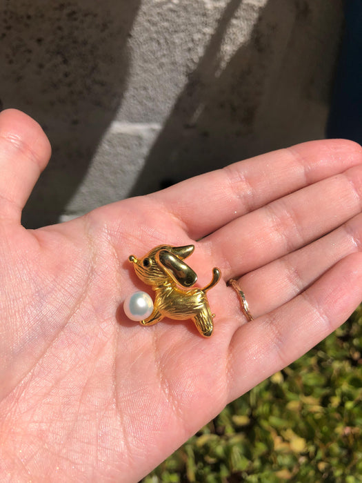 Dog With Pearl Brooch