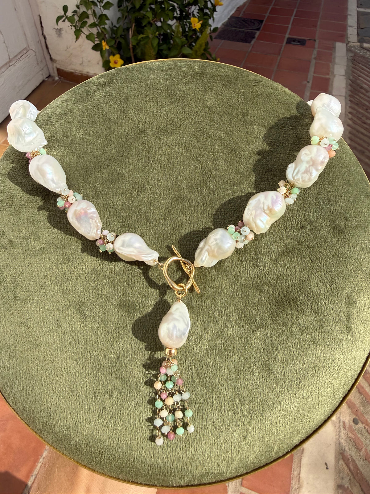 Handcrafted Fiora baroque pearl necklace with organic pearl shapes, pastel gemstone accents and decorative tassel