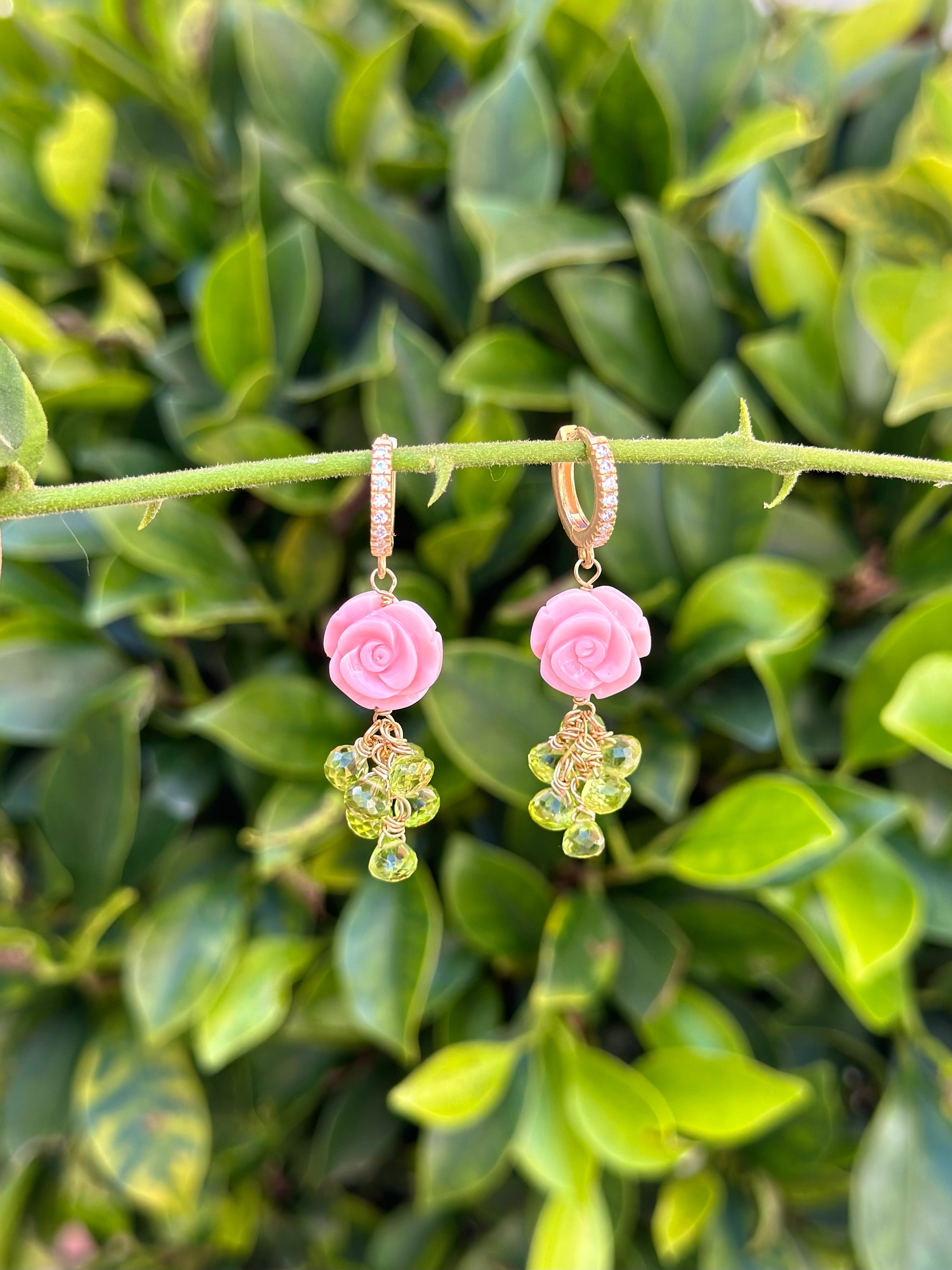 Carved queen conch shell rose and peridot drop earrings
