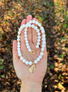 White bead necklace with golden sea shell charm