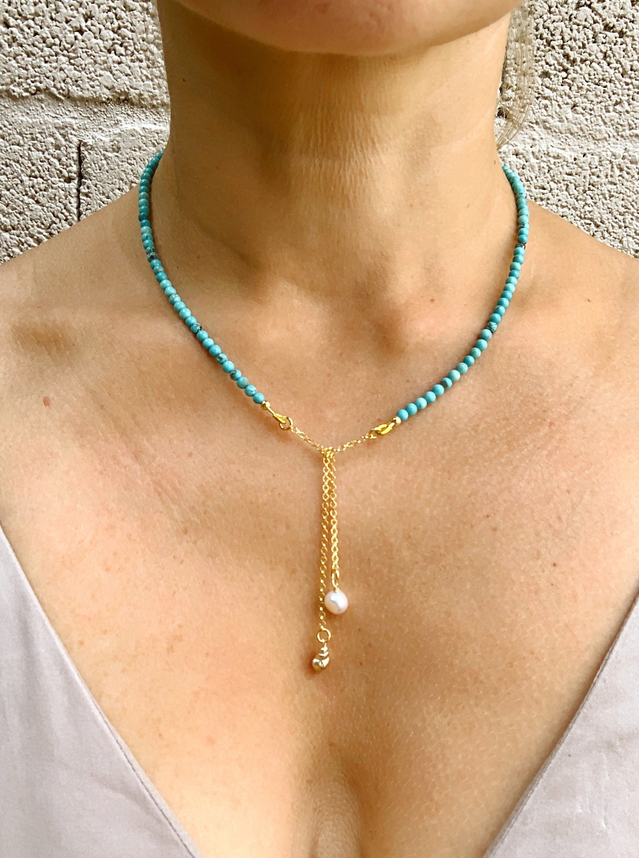 Turquoise, pearl and gold plated silver necklace with shell pendant