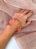 Pink coral and gold plated silver bracelet with marine lock