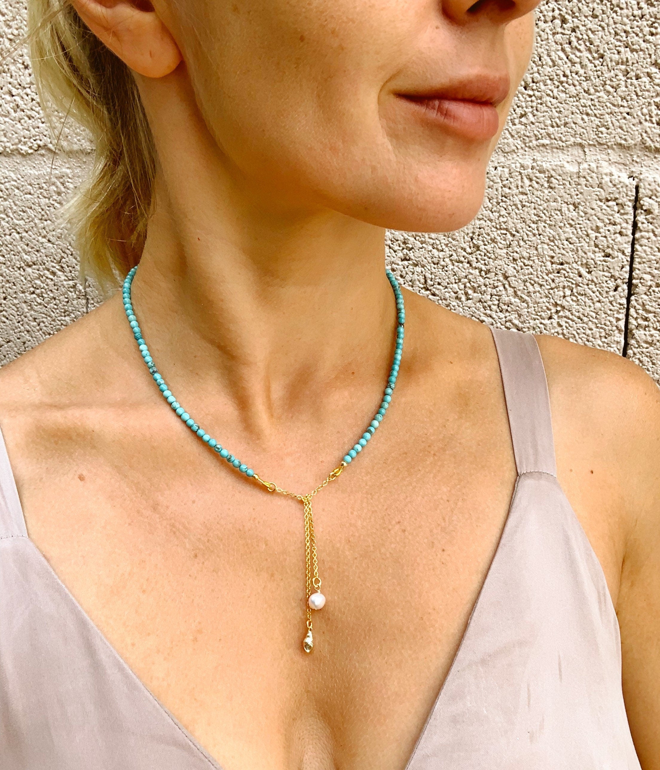 Turquoise, pearl and gold plated silver necklace with shell pendant
