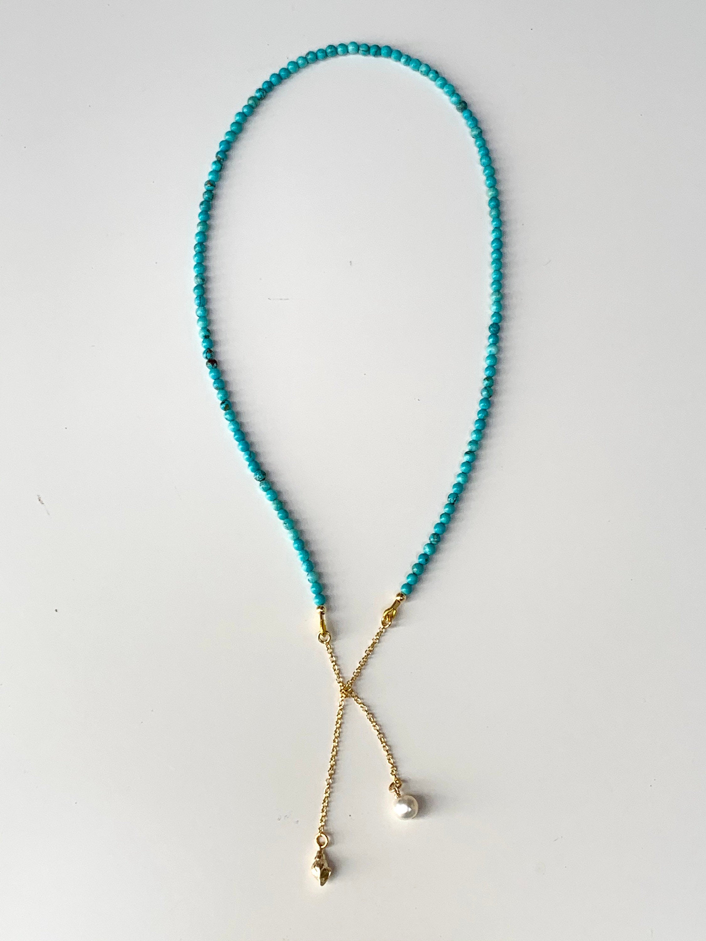 Turquoise, pearl and gold plated silver necklace with shell pendant