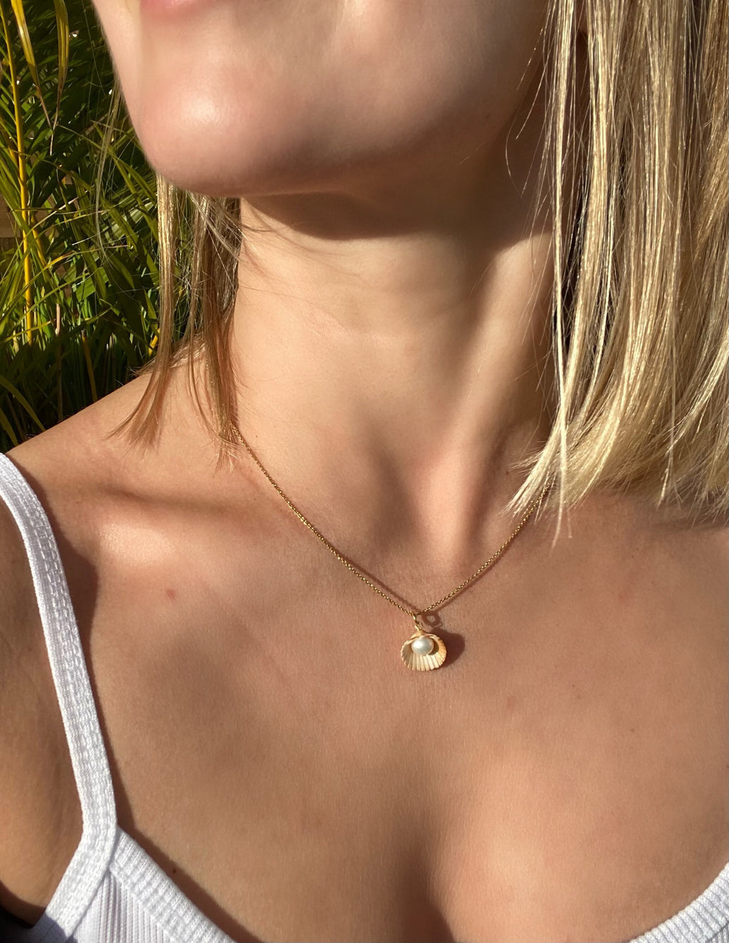 Real Pearl in a Sea Shell Necklace.