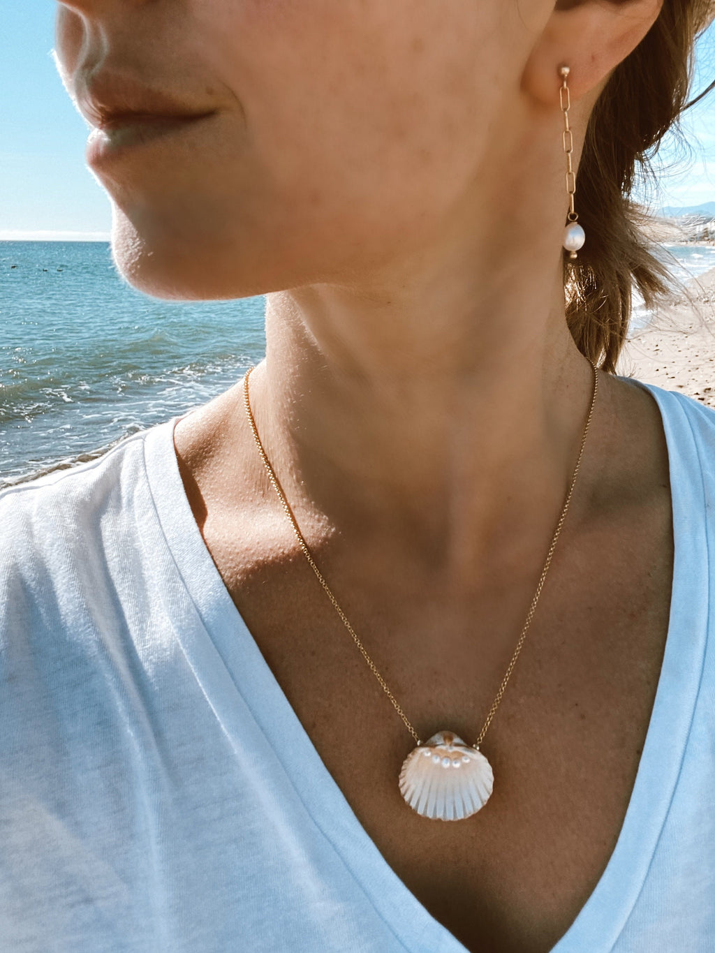 Real shell and mini pearls pendant on gold plated 925 silver chain.