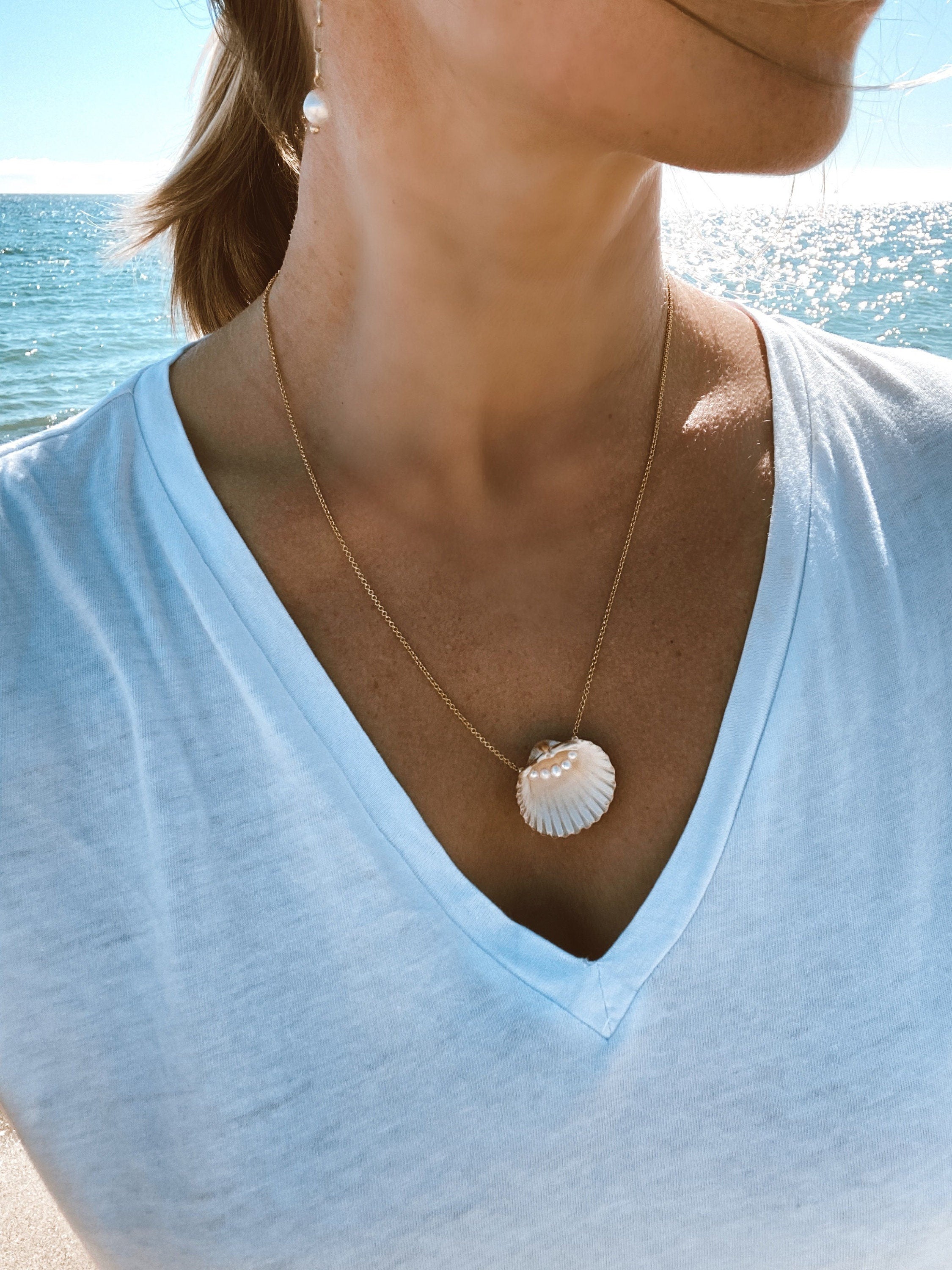 Real shell and mini pearls pendant on gold plated 925 silver chain.