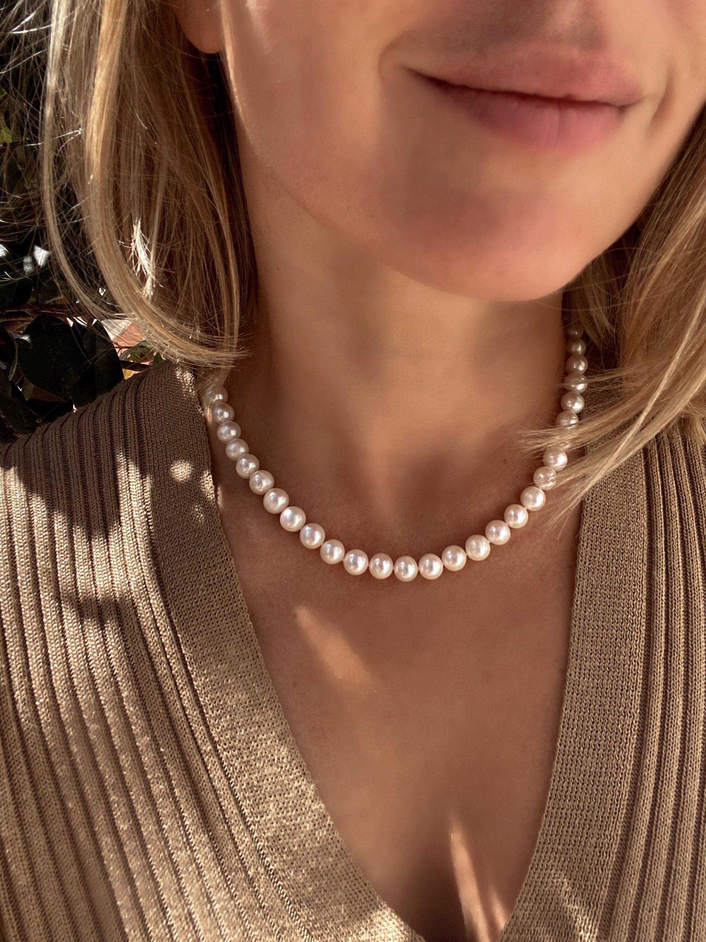 Classic white round pearl necklace with gold vermeil toggle closure