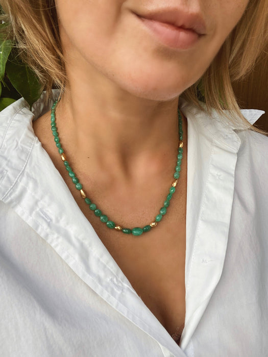 Zambian emerald smooth oval beads necklace with gold vermeil details.