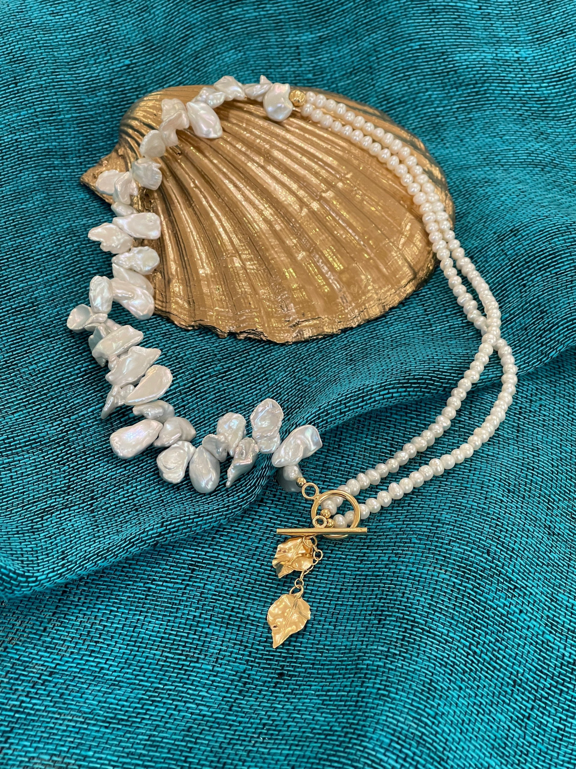 White keshi pearls necklace with golden leaves charms