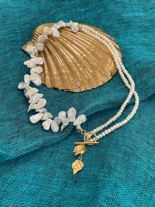 White keshi pearls necklace with golden leaves charms