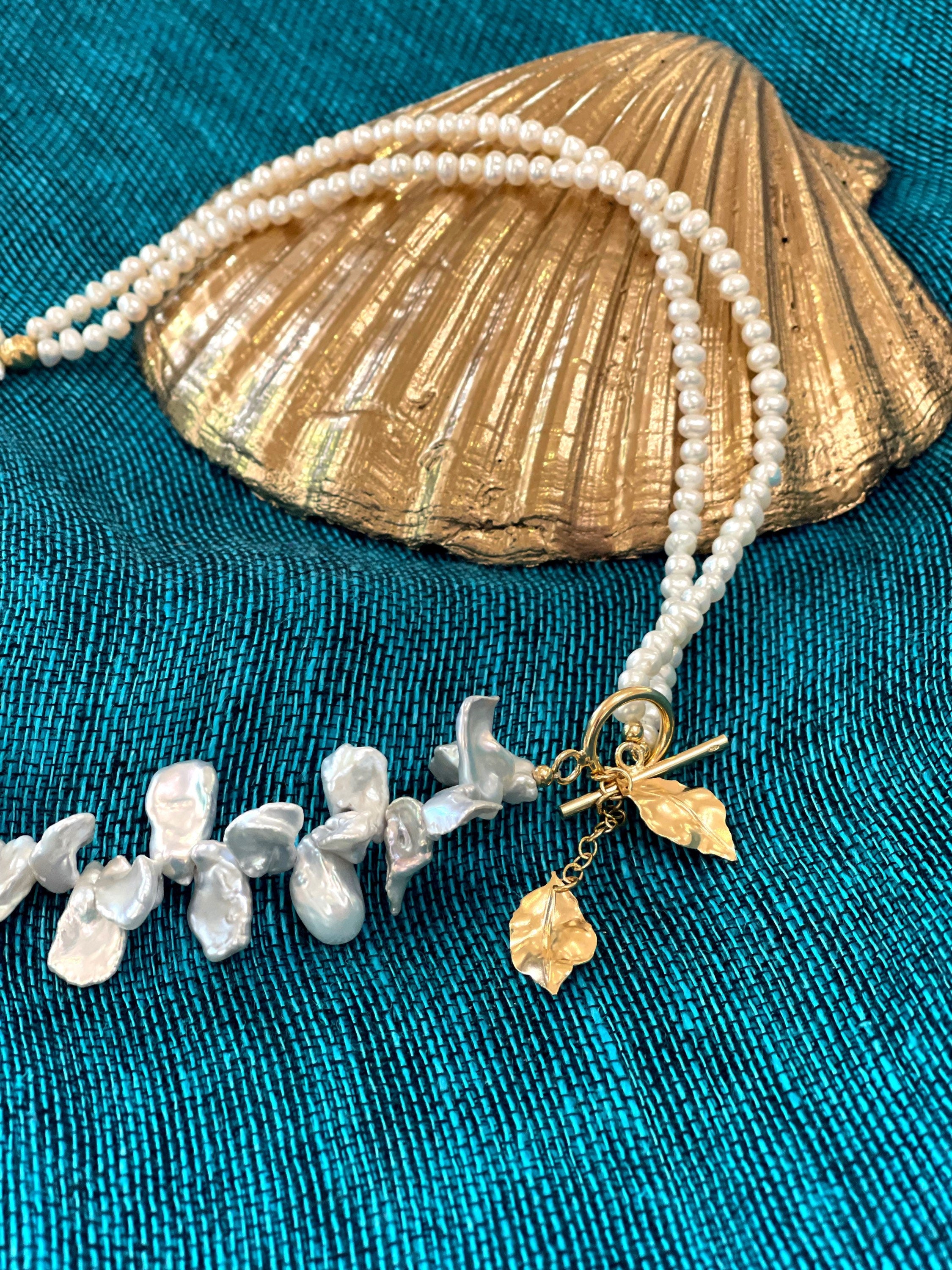 White keshi pearls necklace with golden leaves charms