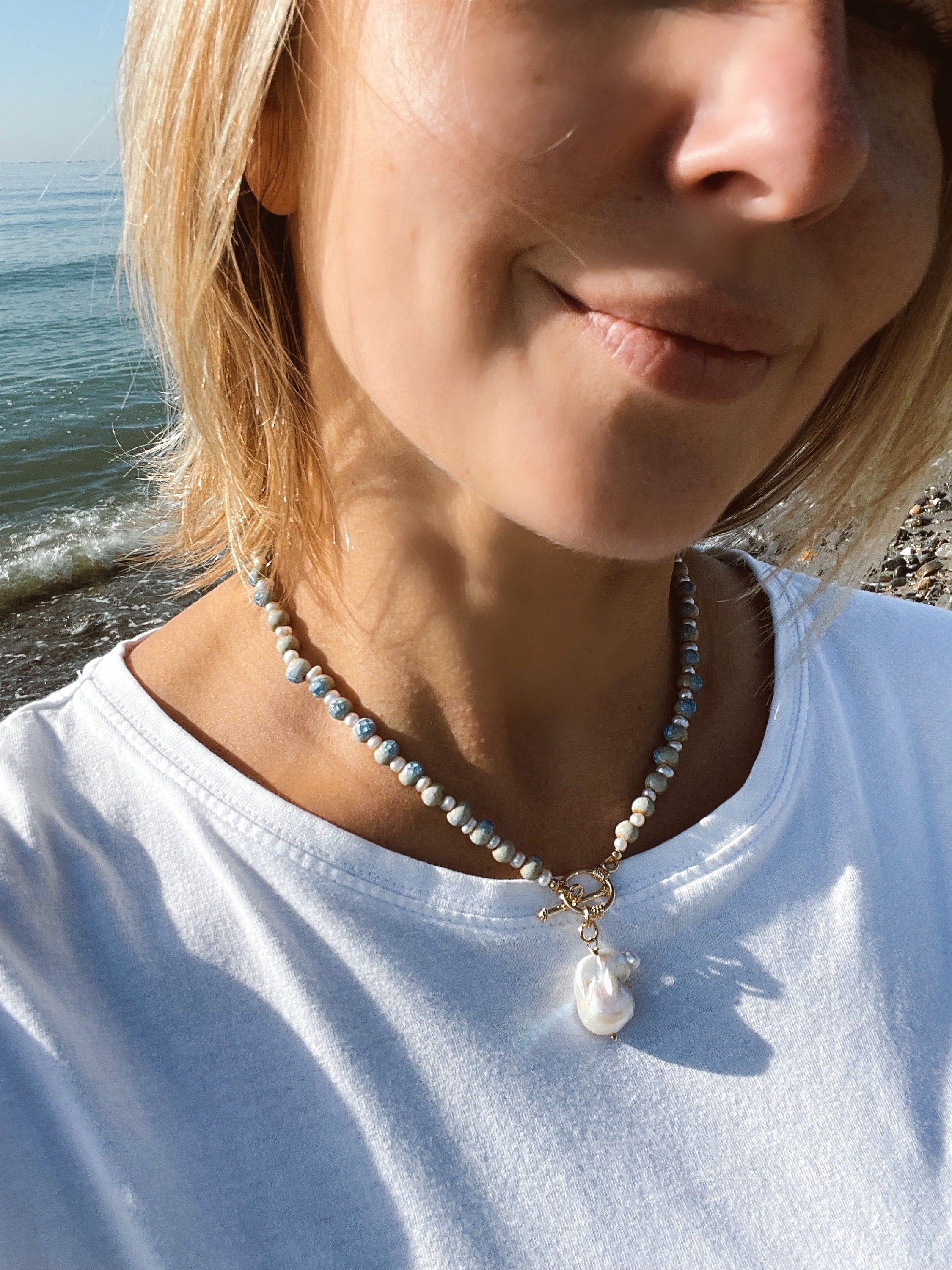 Blue ceramic necklace with baroque pearl pendant