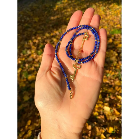 Lapis lazuli beaded necklace with gold plated silver key