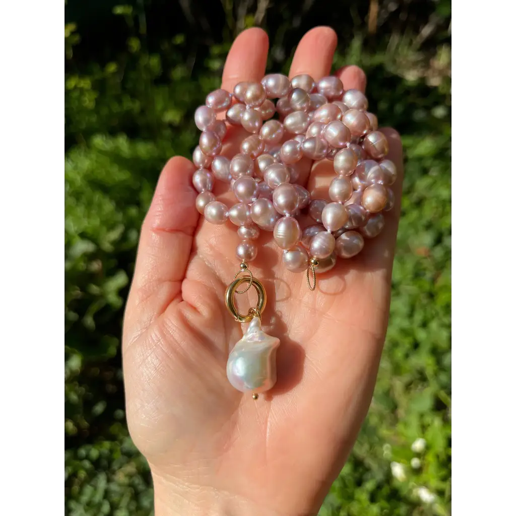 Long layered pearl necklace with baroque pearl pendant