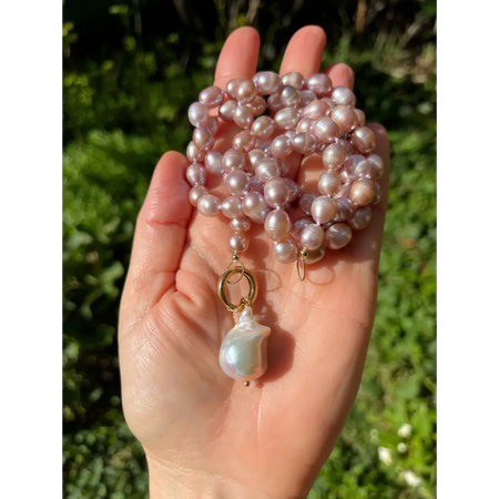 Long layered pearl necklace with baroque pearl pendant