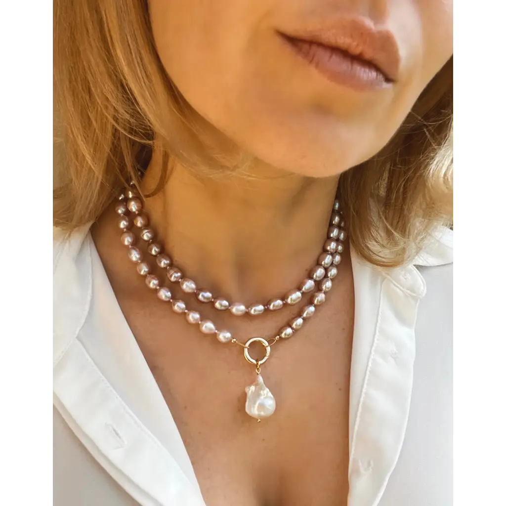 Long layered pearl necklace with baroque pearl pendant