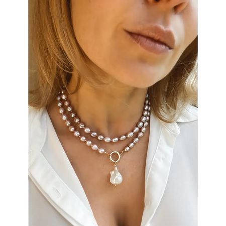 Long layered pearl necklace with baroque pearl pendant