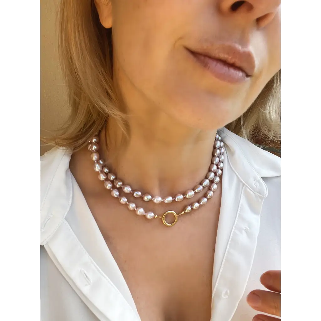 Long layered pearl necklace with baroque pearl pendant