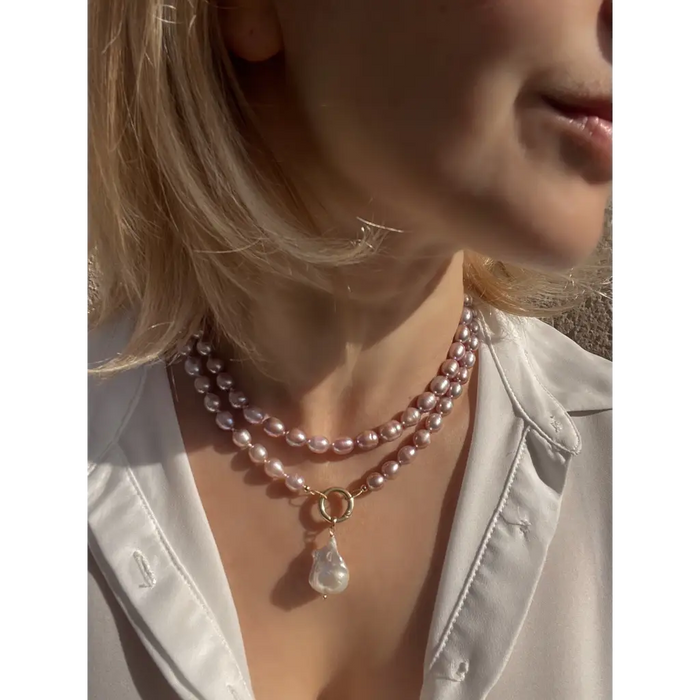 Long layered pearl necklace with baroque pearl pendant