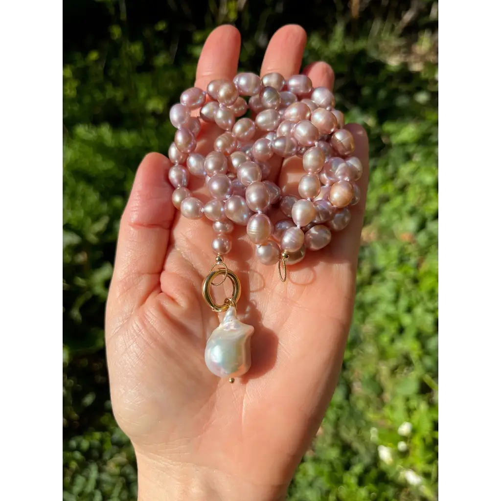 Long layered pearl necklace with baroque pearl pendant