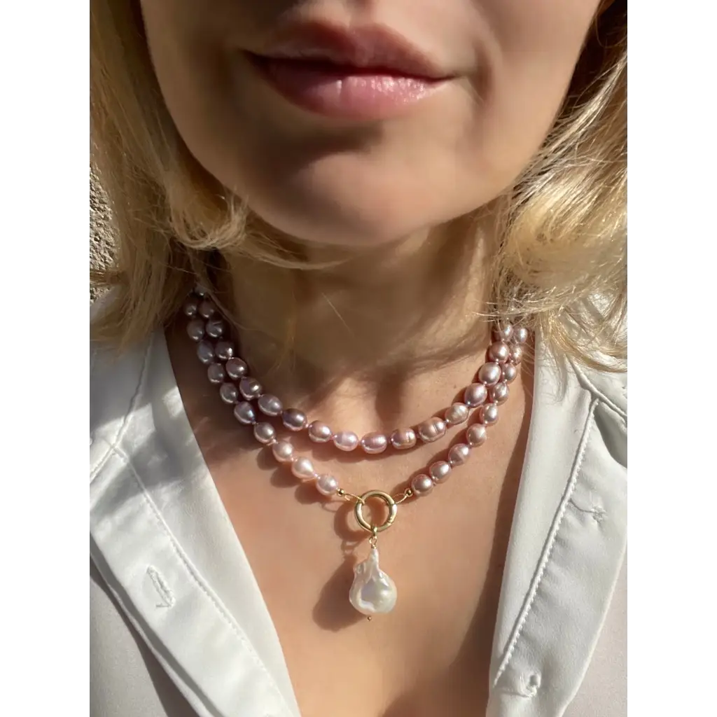 Long layered pearl necklace with baroque pearl pendant