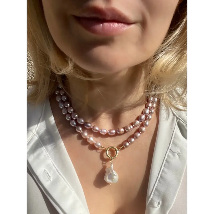 Long layered pearl necklace with baroque pearl pendant