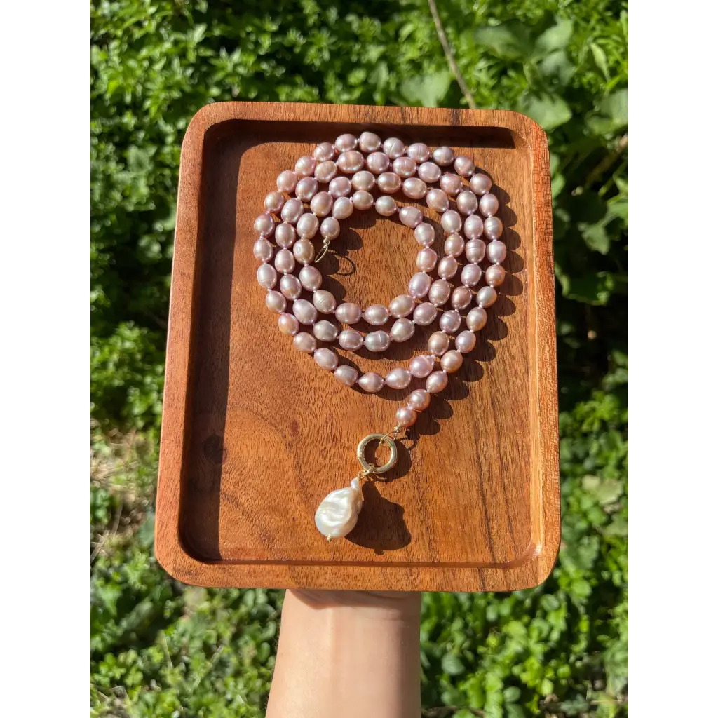 Long layered pearl necklace with baroque pearl pendant