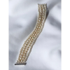 Multi strand pearl bracelet with silver closure
