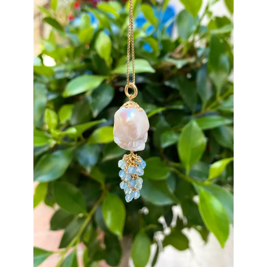 Natural baroque pearl and aquamarines pendant on gold plated