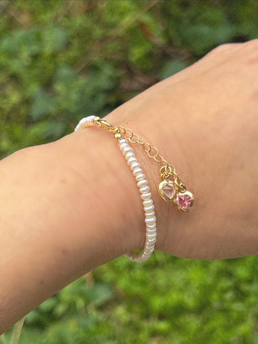 Pearl bracelet with heart charms Beaded Bracelets