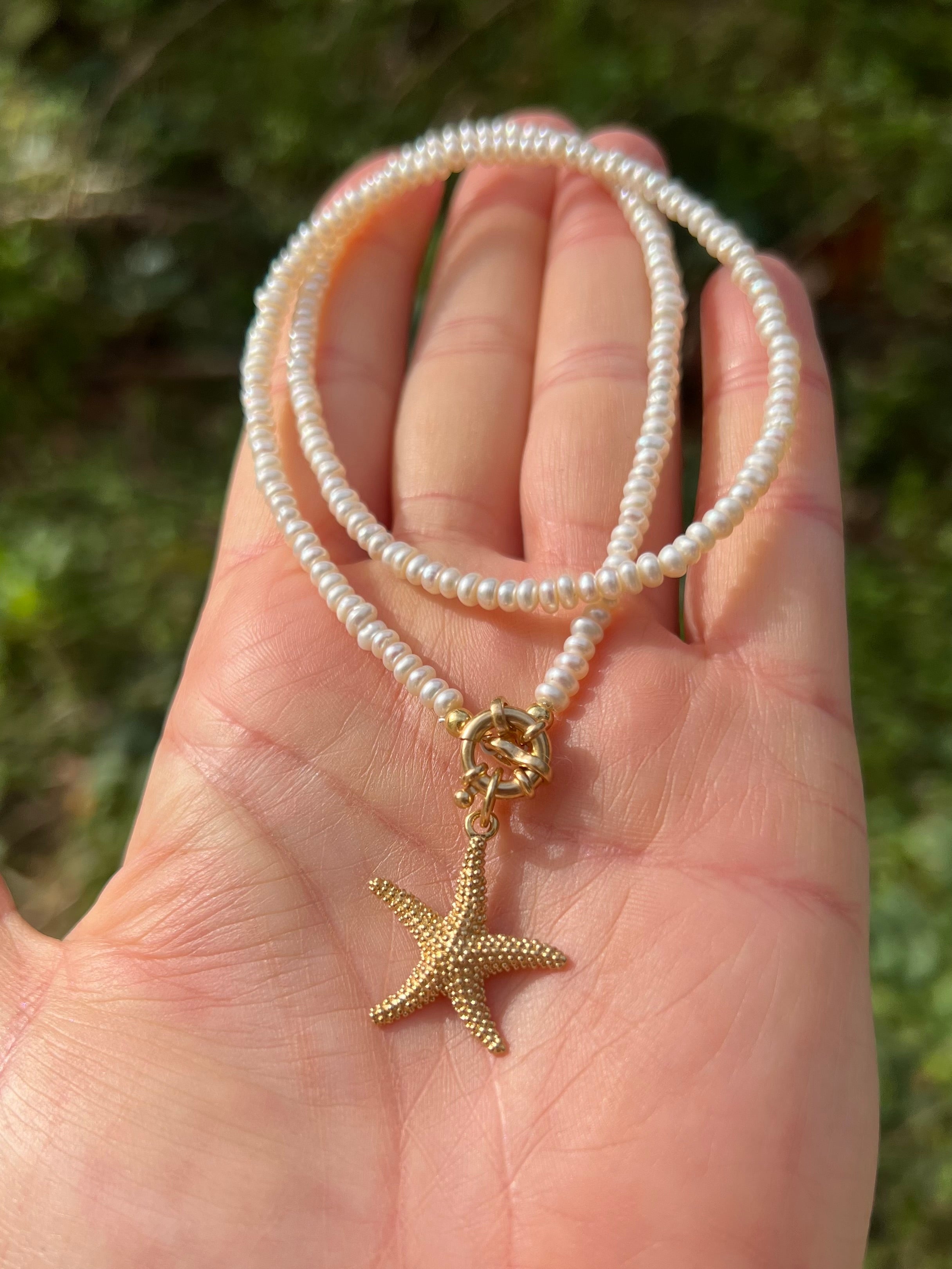 Pearl necklace with golden starfish pendant Beaded Necklaces