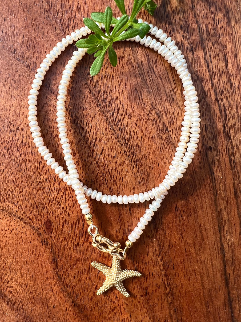 Pearl necklace with golden starfish pendant Beaded Necklaces