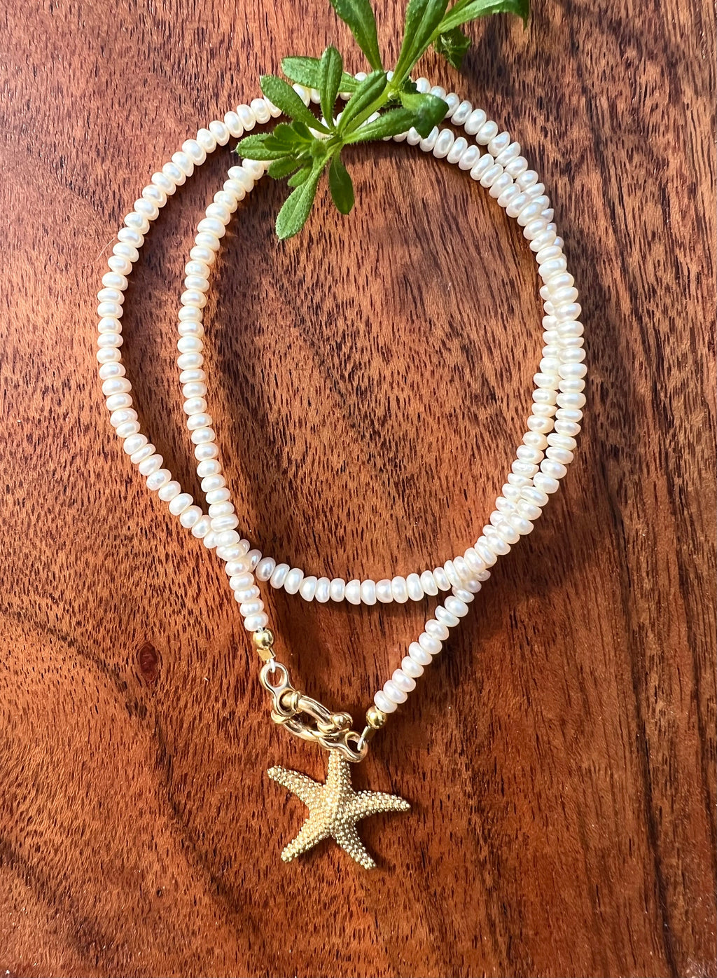 Pearl necklace with golden starfish pendant Beaded Necklaces