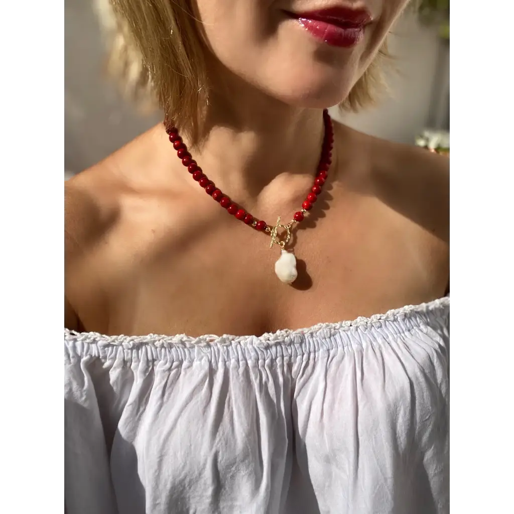 Red coral beaded necklace with toggle closure and baroque