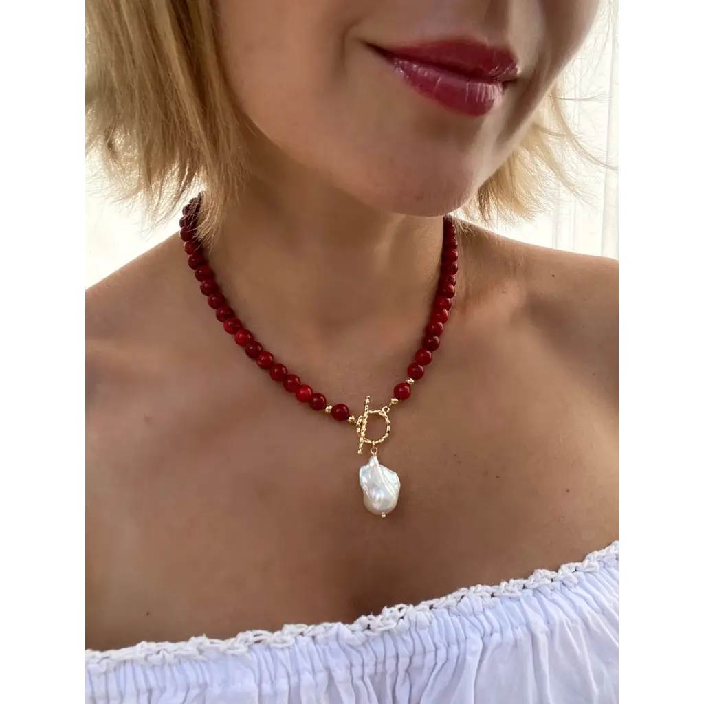Red coral beaded necklace with toggle closure and baroque
