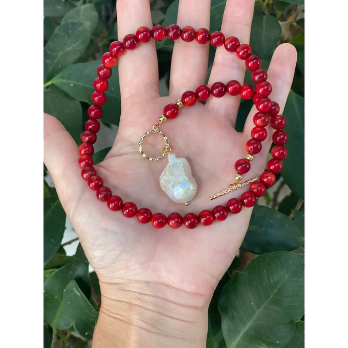 Red coral beaded necklace with toggle closure and baroque