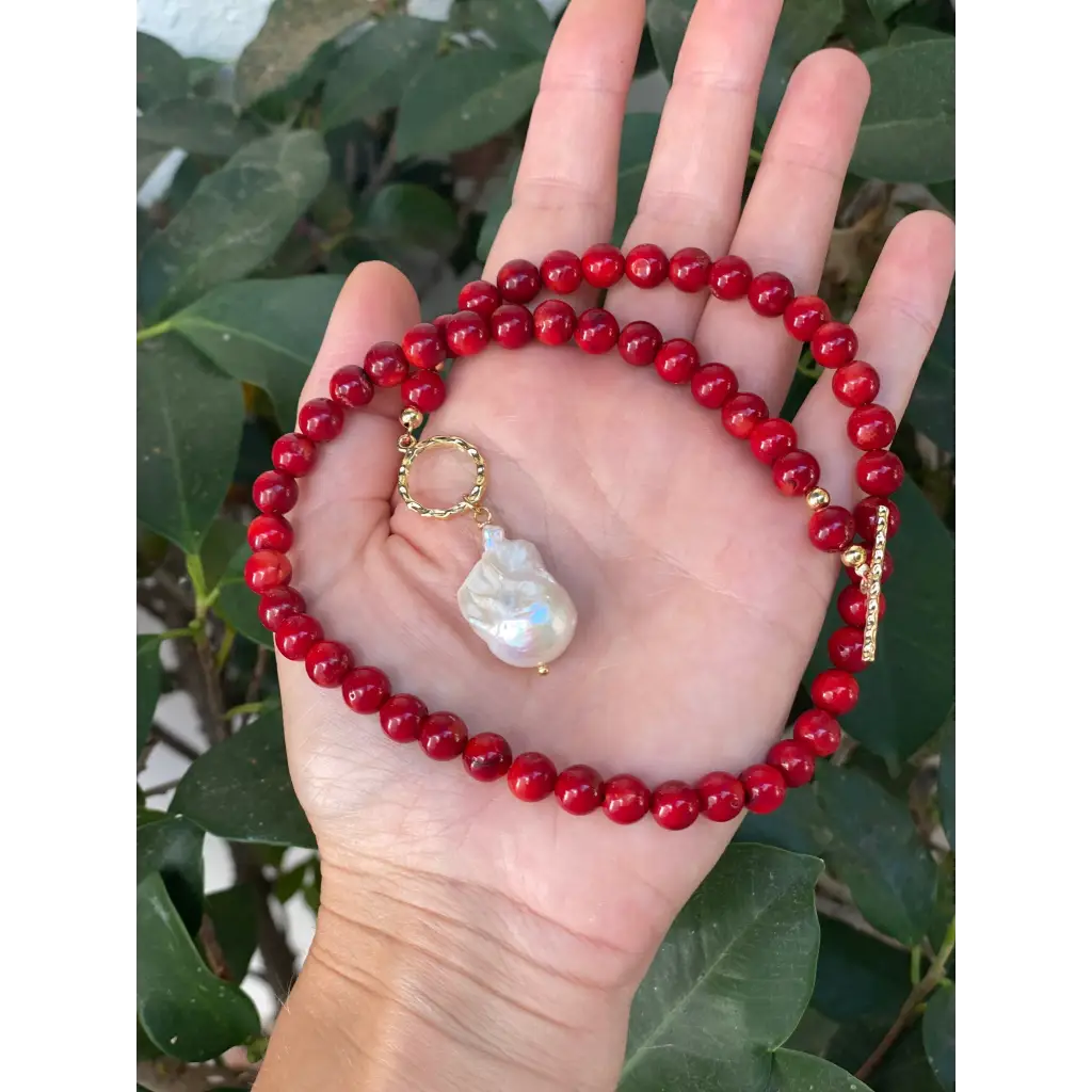 Red coral beaded necklace with toggle closure and baroque
