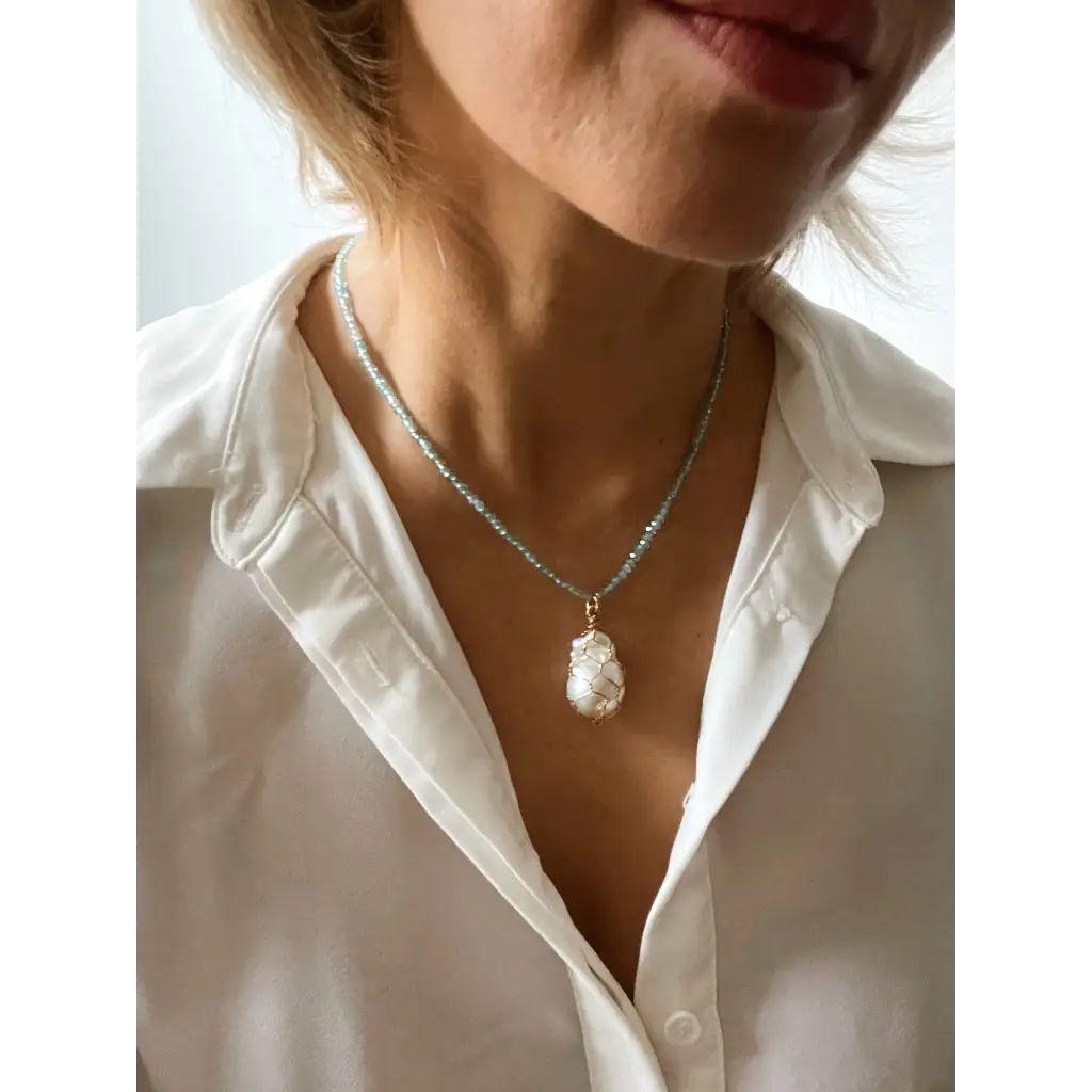 Wire wrapped baroque pearl and sparkling natural blue