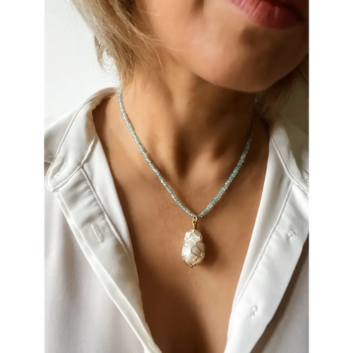 Wire wrapped baroque pearl and sparkling natural blue