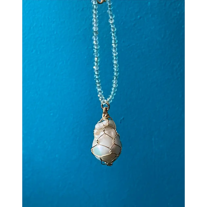 Wire wrapped baroque pearl and sparkling natural blue