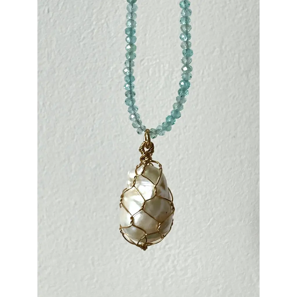 Wire wrapped baroque pearl and sparkling natural blue
